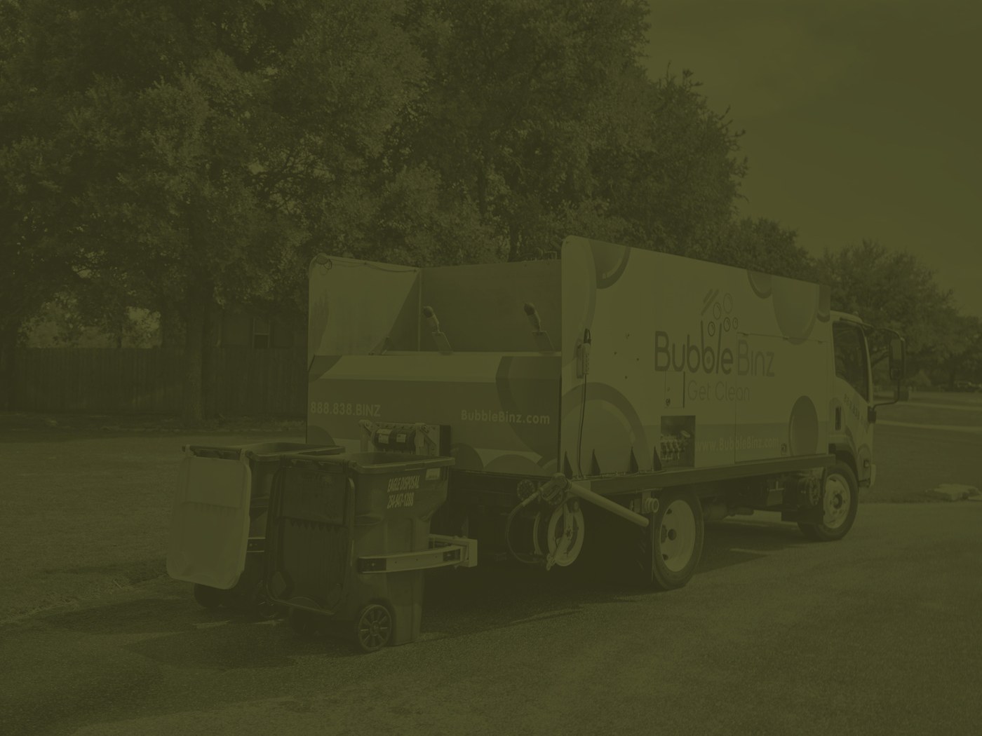Bubble Binz truck parked on a neighborhood route